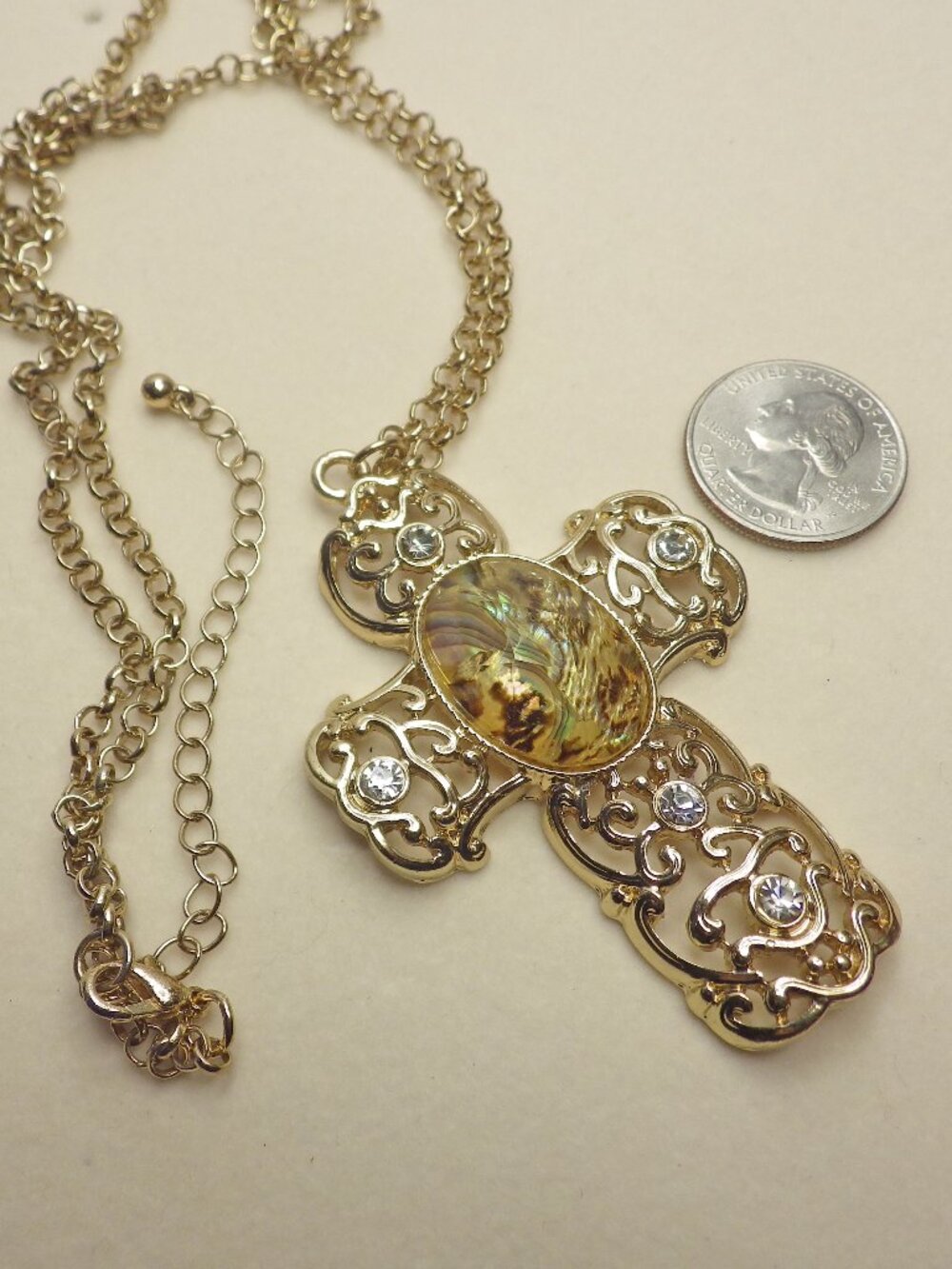 Rhinestone Cross on Gold Tone Chain 714G2